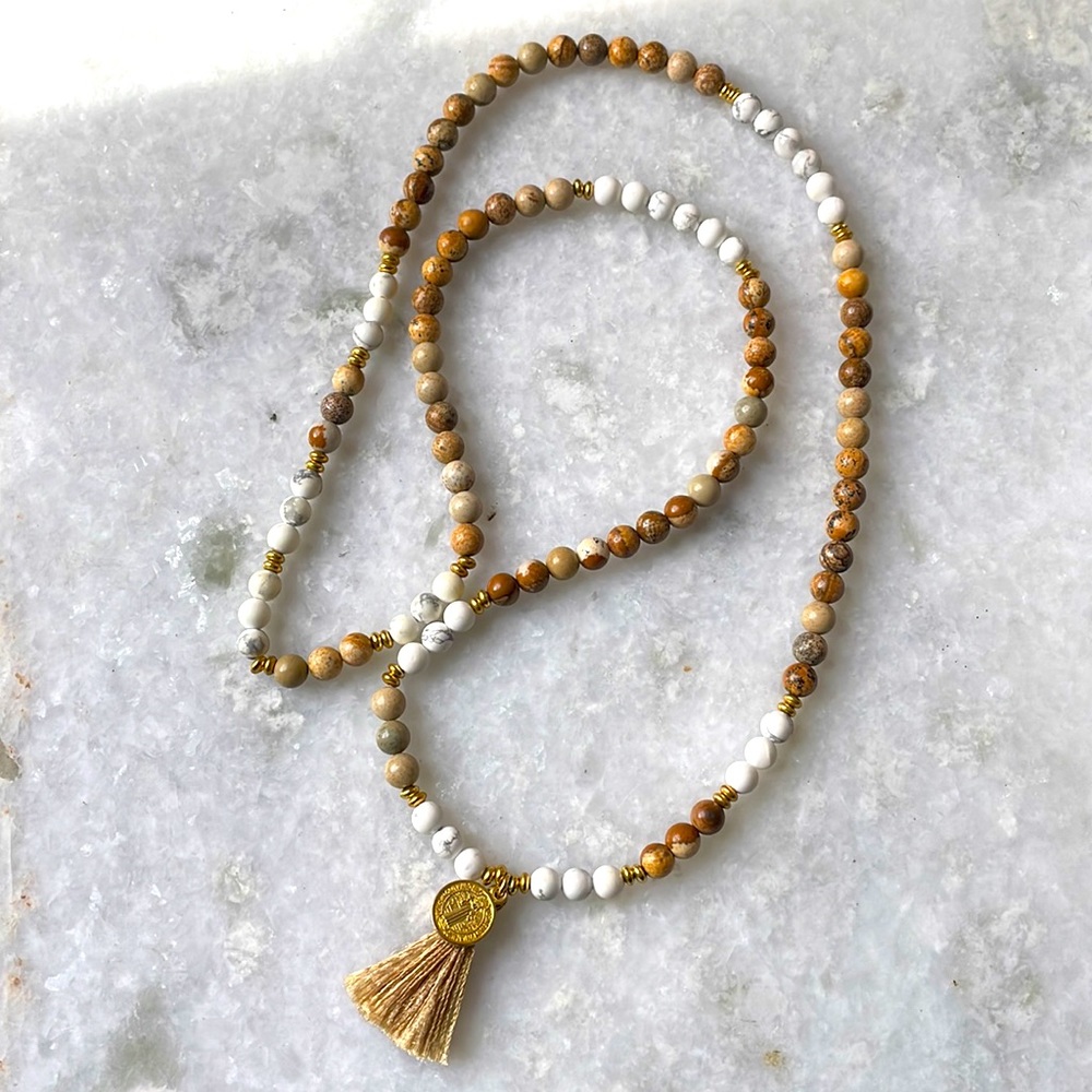 Mala necklace with tassel and gold medallian